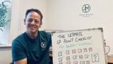 James Murray Finance holding a whiteboard checklist in the office with the title “17-Point Cash Flow Checklist Before You Apply for a Business Loan in the UK
